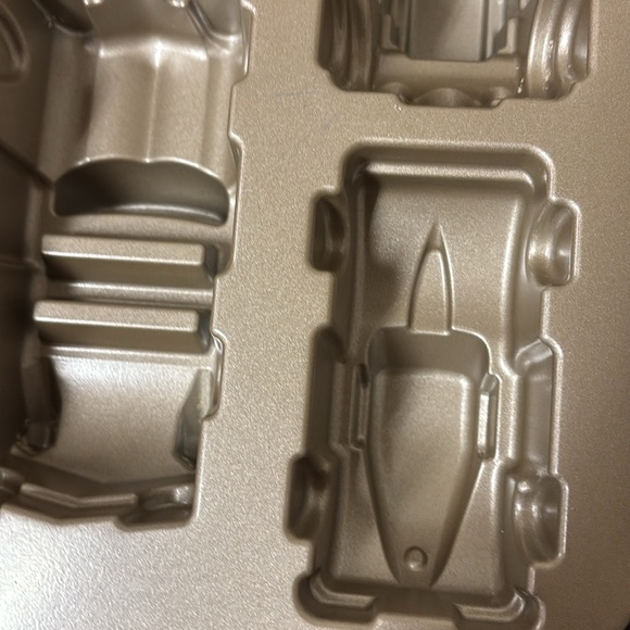 Practically new  Nordic Ware baking mold of eight mini car shapes. - Picture 4 of 7